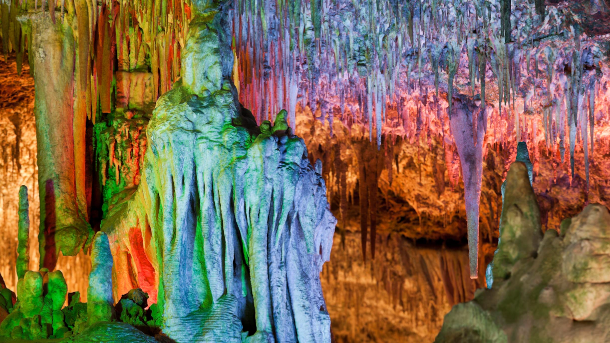 Colorful stalactites and stalagmites inside Drach Caves, Mallorca.