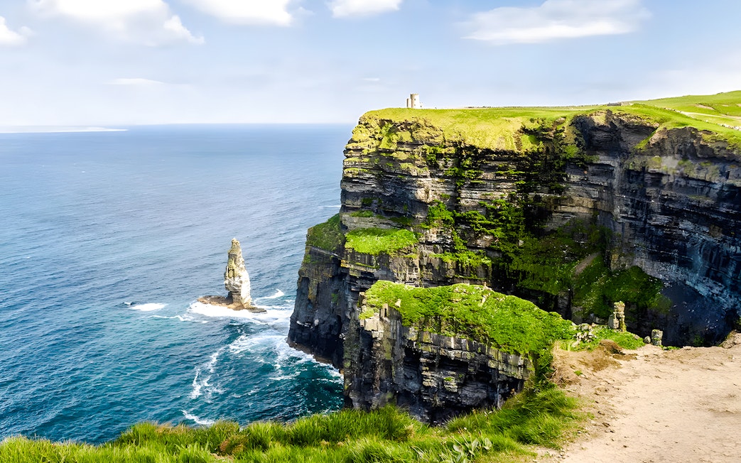 Cliffs of Moher with ocean view and O'Brien's Tower in County Clare, Ireland.
