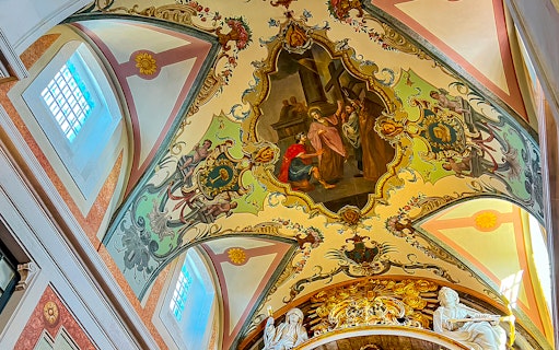 Ceiling fresco and sculptures inside St. George's Castle Church tower, Lisbon.