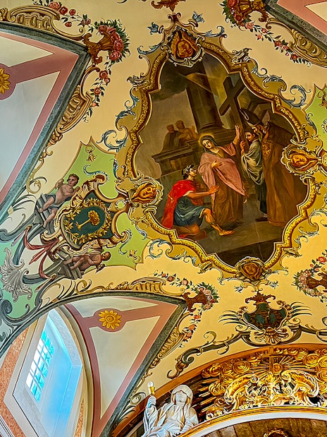 Ceiling fresco and sculptures inside St. George's Castle Church tower, Lisbon.