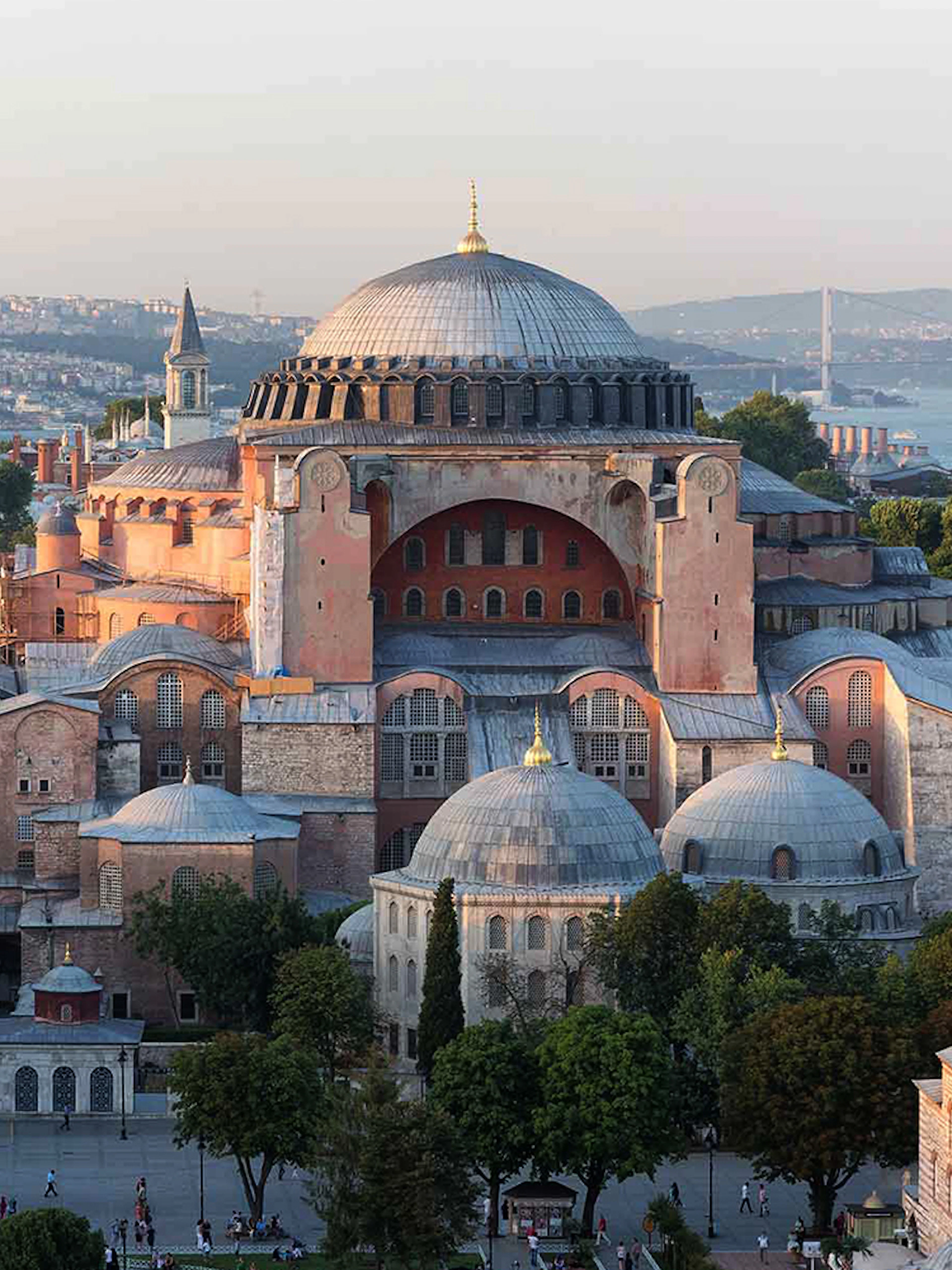 Hagia Sophia in Istanbul with minarets and Bosphorus view in the background.