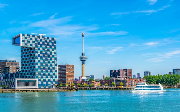 Euromast tower viewed from a Rotterdam cruise boat on the river.