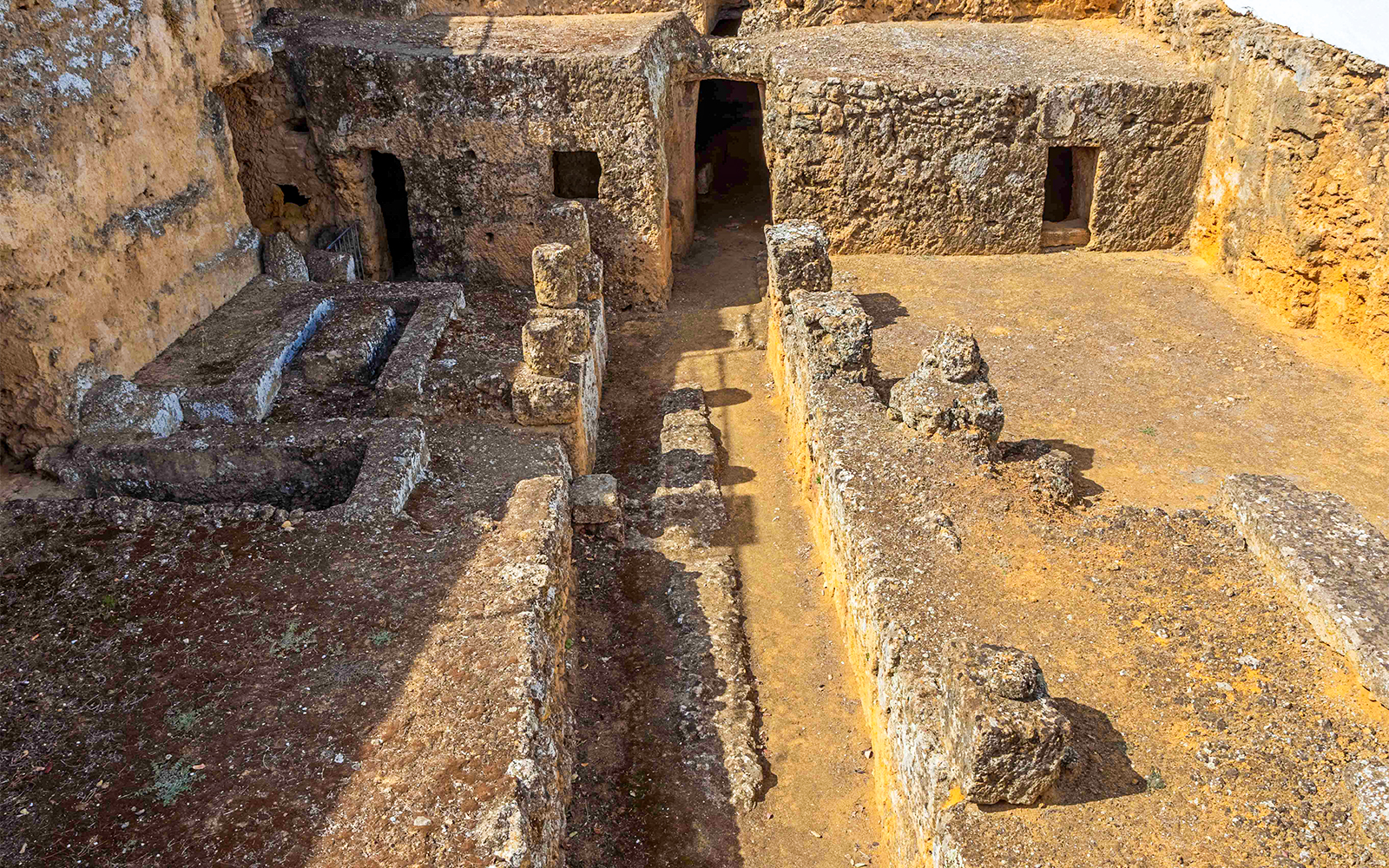 Ancient stone tombs and pathways in the Vatican Necropolis.