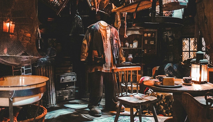 Hagrid's hut at Harry Potter Studio Tour, featuring rustic exterior and pumpkin patch.