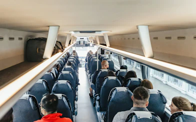 Passengers seated in ATVO airport transfer bus, Venice.