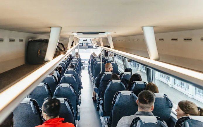 Passengers seated in ATVO airport transfer bus, Venice.