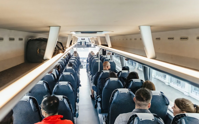 Passengers seated in ATVO airport transfer bus, Venice.