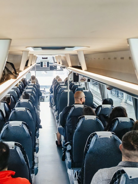 Passengers seated in ATVO airport transfer bus, Venice.