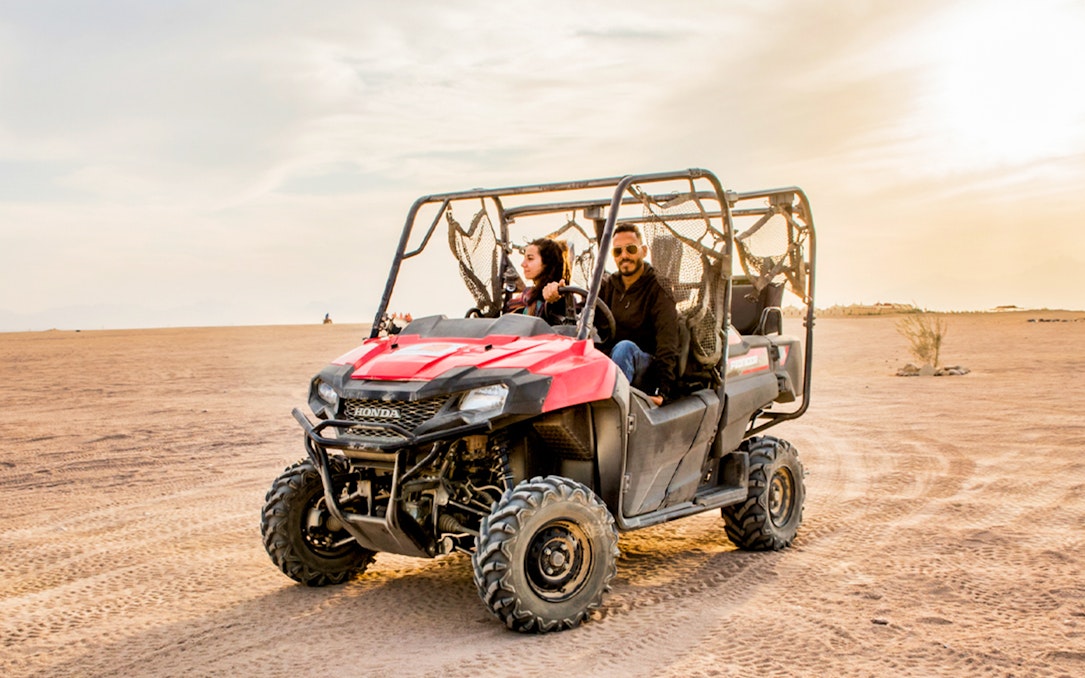 Quad bike ride in Hurghada desert during safari tour.