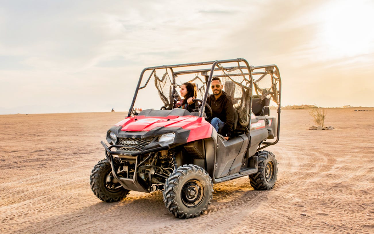 Quad bike ride in Hurghada desert during safari tour.