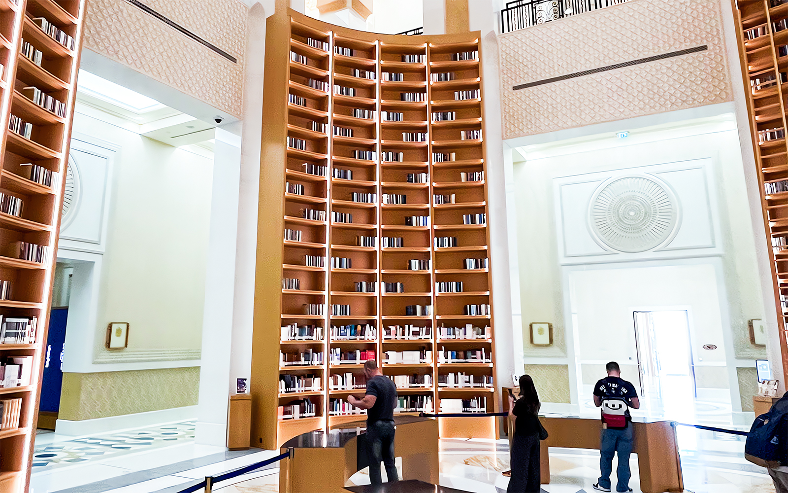 Qasr Al Watan library interior with ornate ceiling and bookshelves, Abu Dhabi.