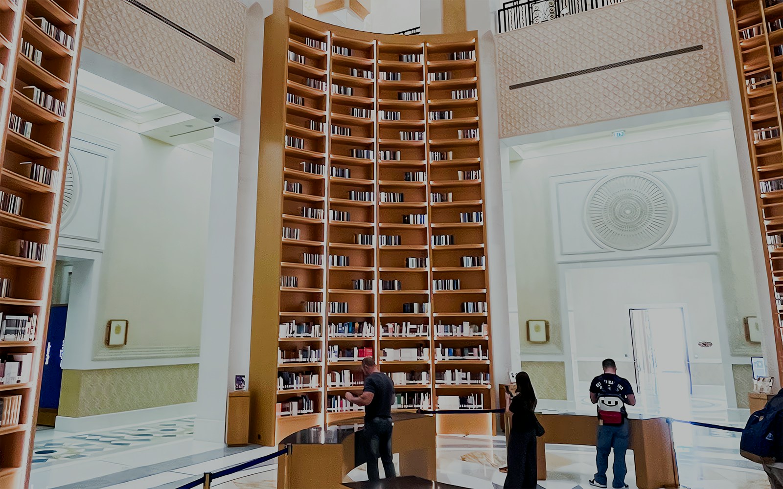 Qasr Al Watan library interior with ornate ceiling and bookshelves, Abu Dhabi.