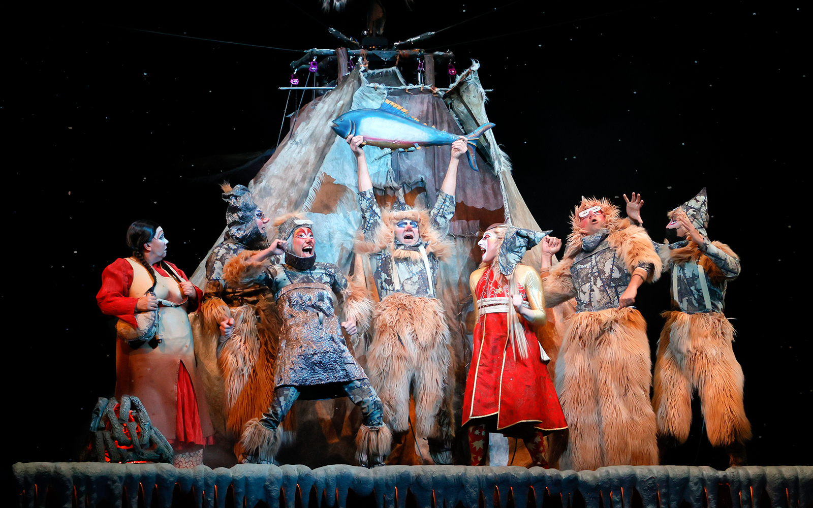Performers in elaborate costumes on stage during Cirque du Soleil KÀ show.