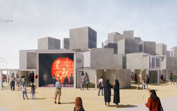 Visitors at Expo 2025 Osaka viewing a large sun display in a modern architectural setting.