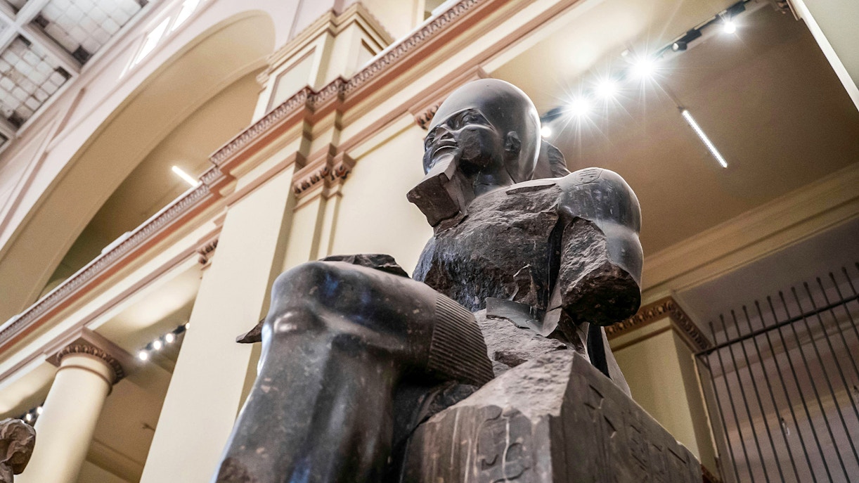 Statue of a Pharaoh in the Grand Egyptian Museum, Cairo, Egypt.