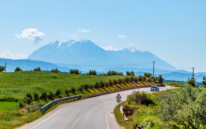 Winding road with mountain views on Berat City & Belshi Lake Day Trip from Durres.