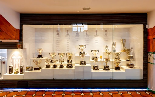 Valencia CF trophy display at Mestalla Forevertour in Valencia, showcasing various football cups and awards.