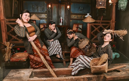 Bali traditional costumes worn by four people at Asana Artseum, Garuda Wisnu Kencana.