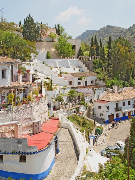 Sacromonte village cave houses on hill slopes, Granada, Spain.