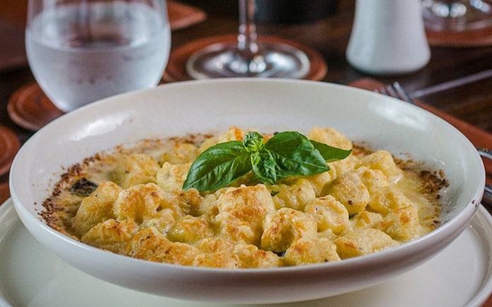 Gnocchi dish served at Aljibe Tango Show in Buenos Aires.