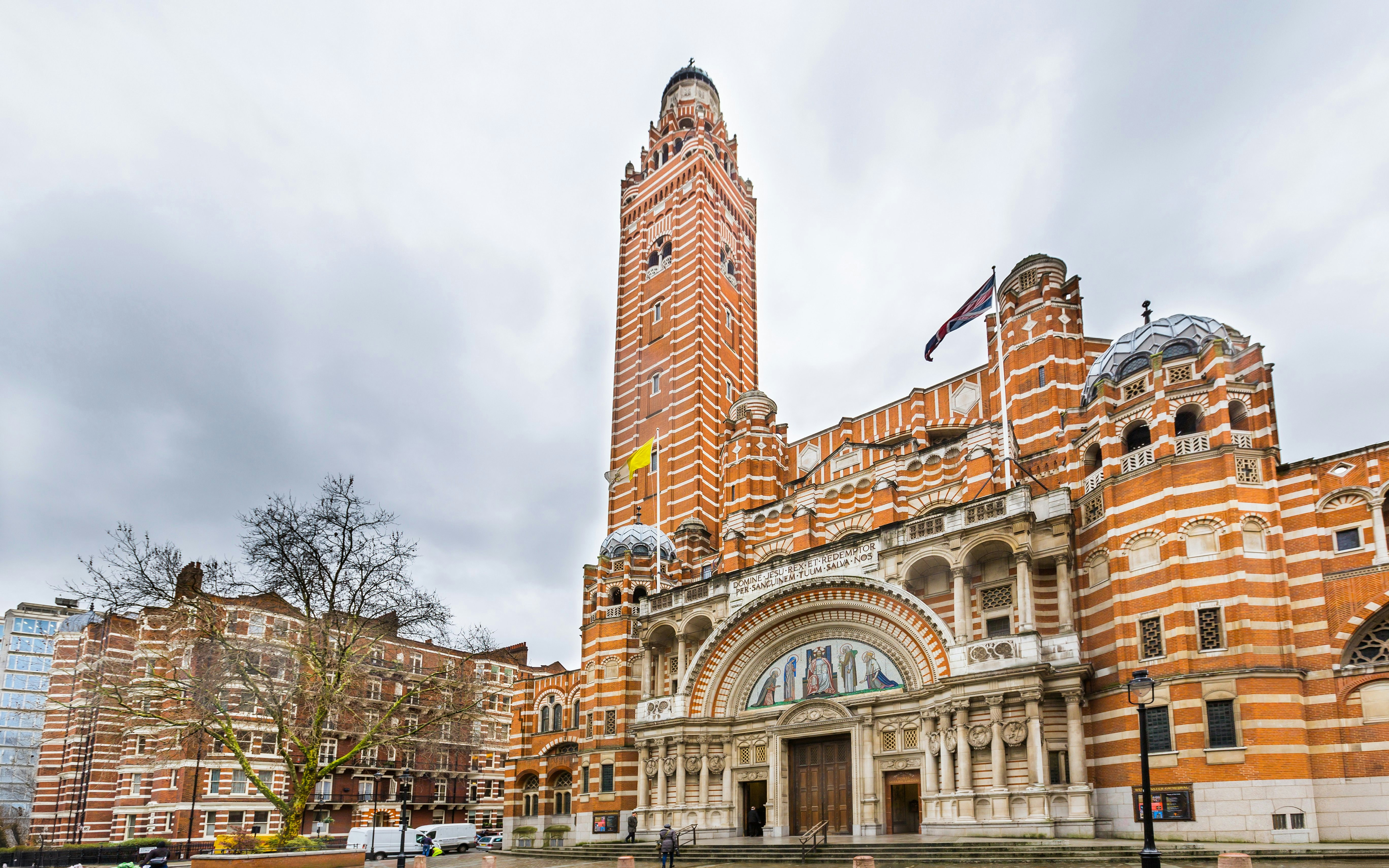 Westminster Cathedral's facade with its distinctive red brick and bell tower in London.