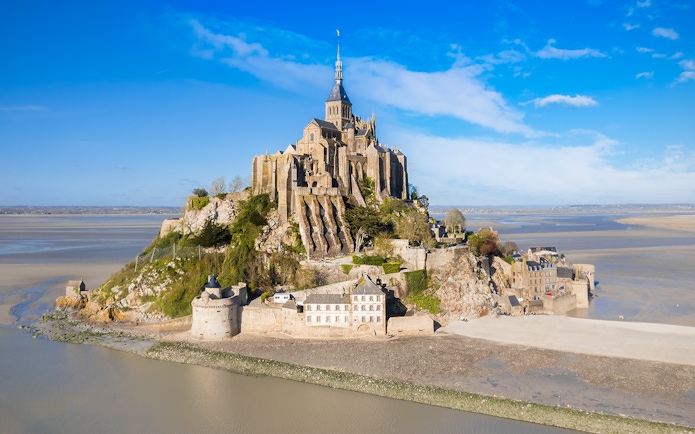 Mont Saint-Michel abbey on tidal island in Normandy, France.