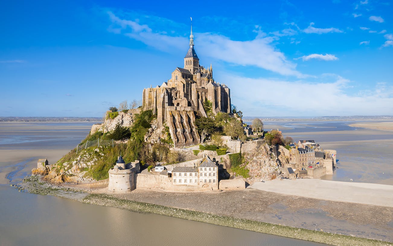 Mont Saint-Michel abbey on tidal island in Normandy, France.