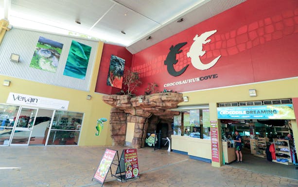Crocosaurus Cove entrance with rock feature and signage in Darwin, Australia.