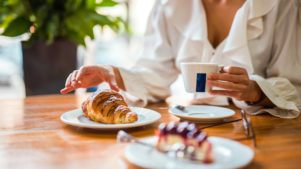 Croissant on a table at Rodin Museum Cafe, Paris.