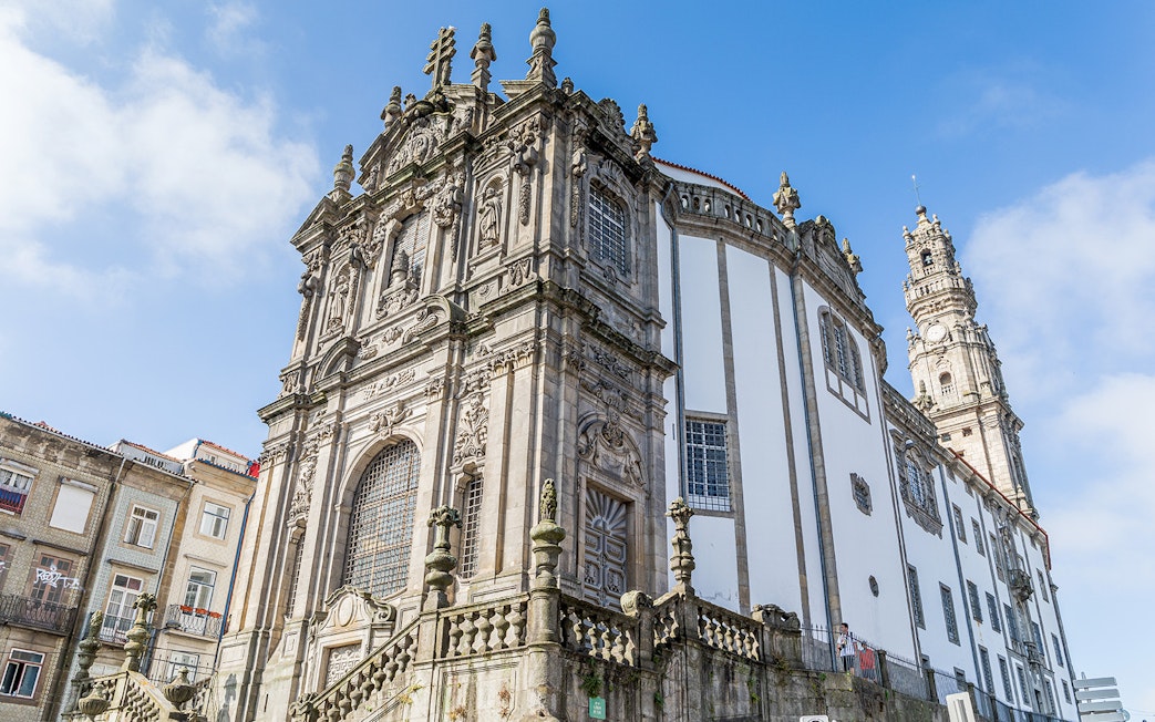 Clérigos Church in Porto, Portugal, featuring its ornate baroque facade and iconic bell tower.
