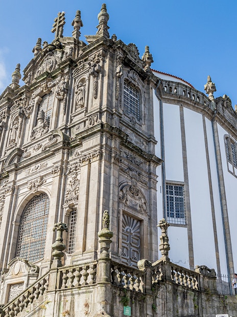 Clérigos Church in Porto, Portugal, featuring its ornate baroque facade and iconic bell tower.