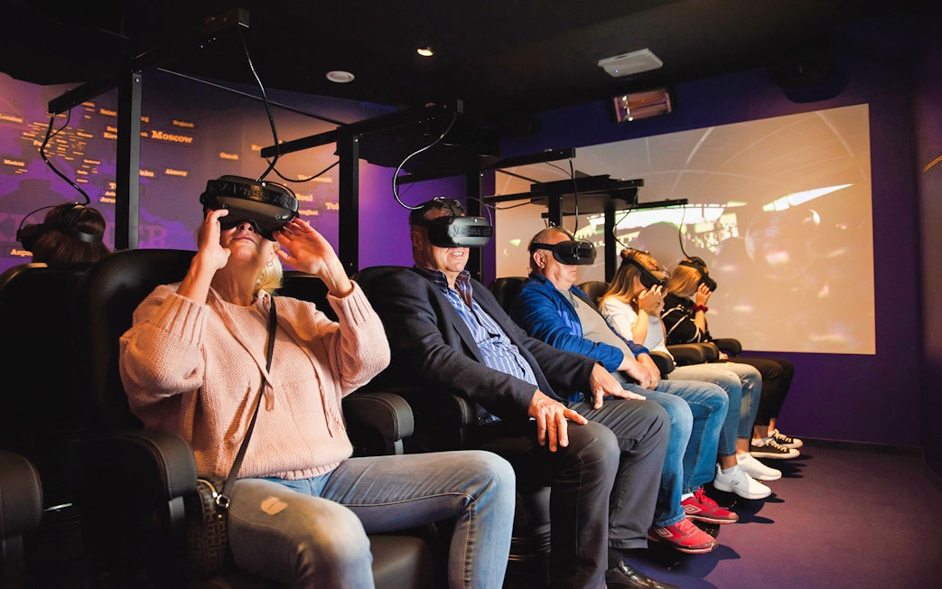 Visitors enjoying 5D VR experience at Slivovitz Museum.