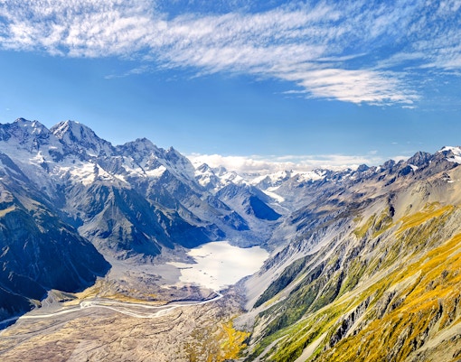 Southern Alps mountain range with snow-capped peaks and valleys in New Zealand.