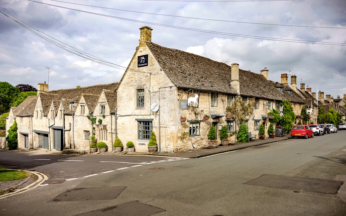Historic stone pub in Cotswolds village, part of Oxford tour with country lunch.
