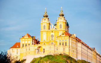 Melk Abbey in sunlight, part of Hallstatt Highlights Day Trip from Vienna.