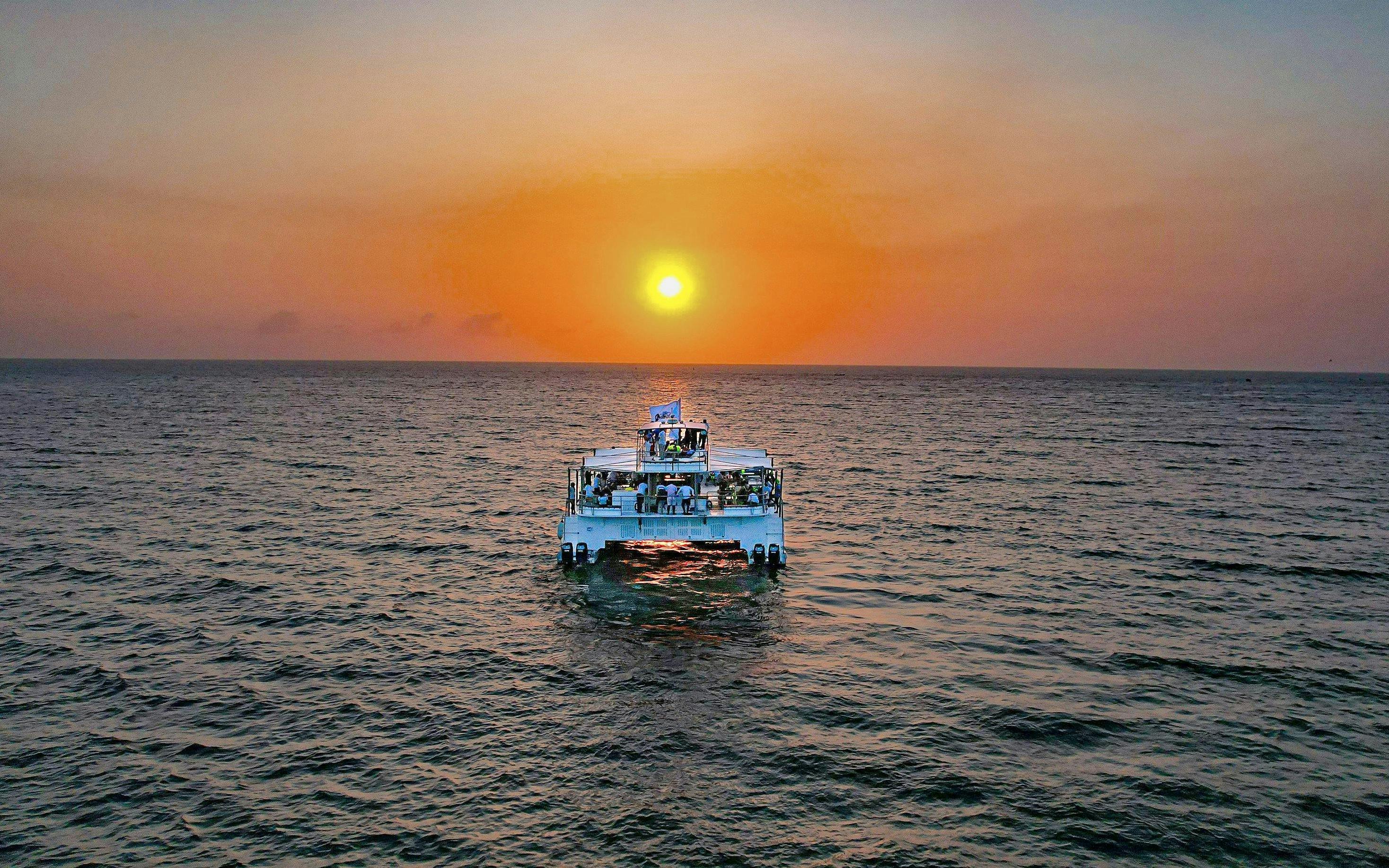 Catamaran sailing at sunset with open bar in Cartagena.