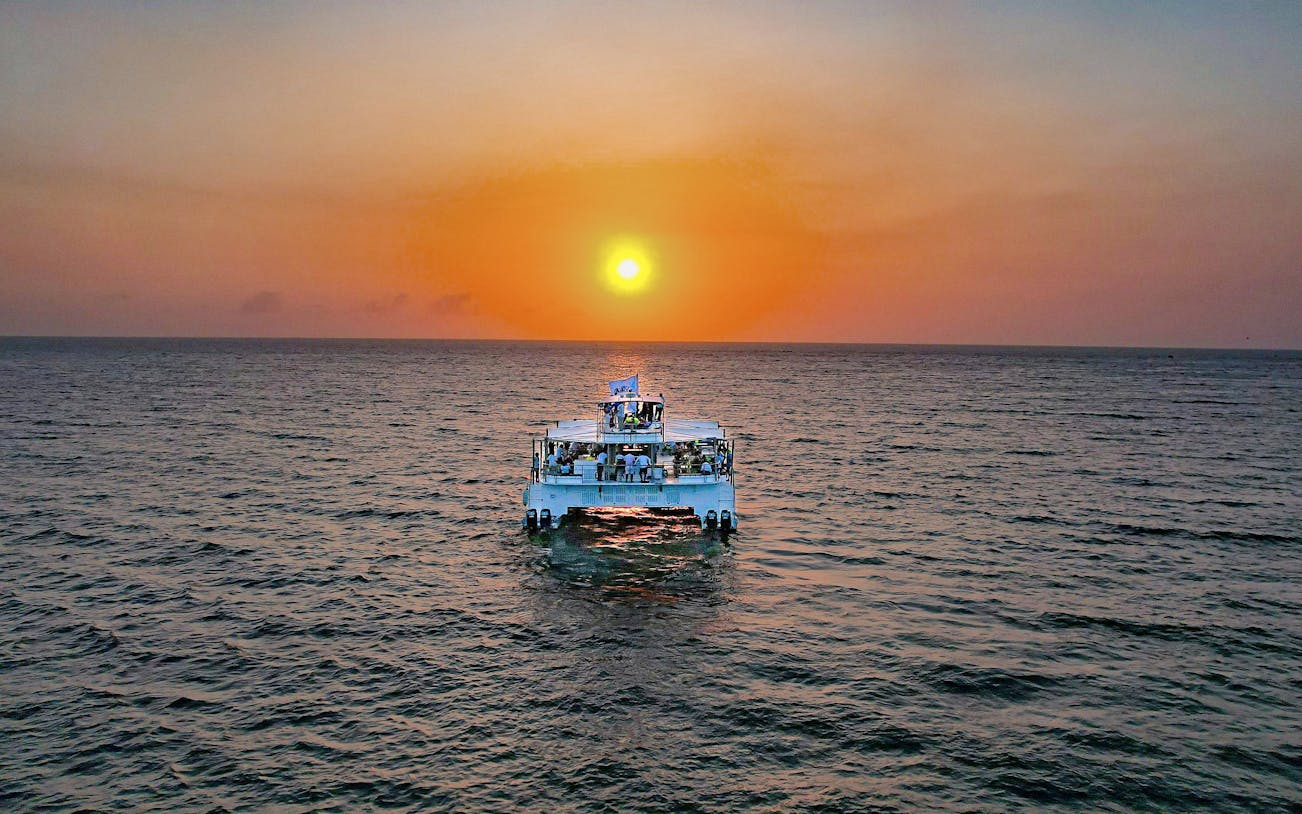Catamaran sailing at sunset with open bar in Cartagena.