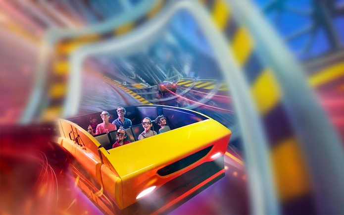 Visitors enjoying a roller coaster ride at Ferrari World Abu Dhabi.