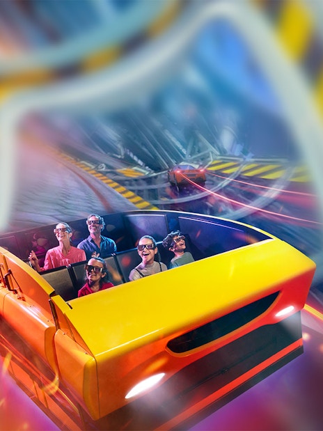Visitors enjoying a roller coaster ride at Ferrari World Abu Dhabi.