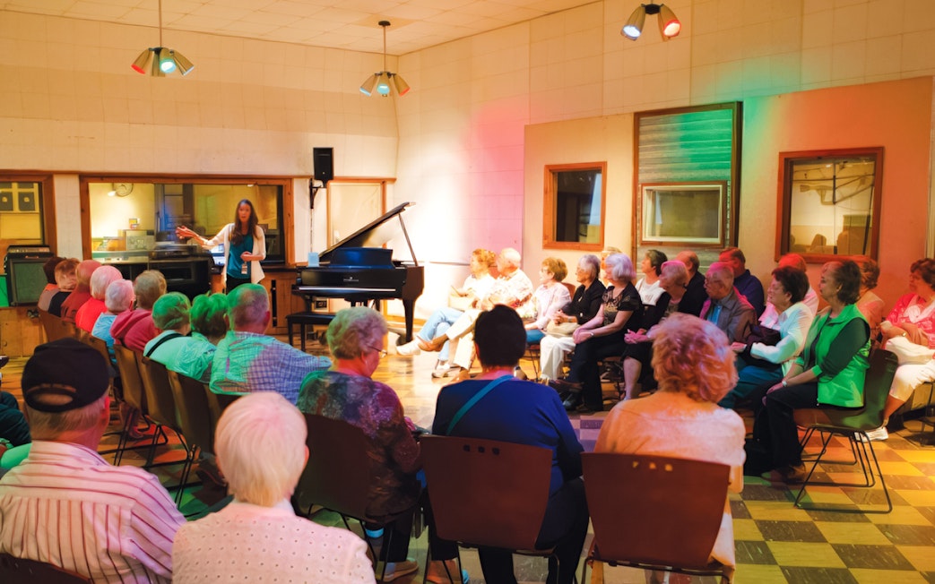 Visitors attending a presentation at the Country Music Hall of Fame and Museum.