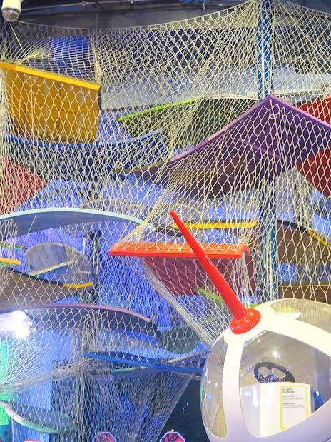 Colorful climbing structure at KidsSTOP Singapore.