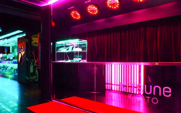 KITSUNE Kyoto Nightclub entrance with neon lights and signage.
