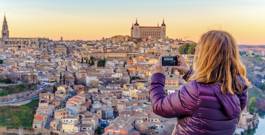 Woman at the Mirador del Valle viewpoint on a half day tour of Toledo