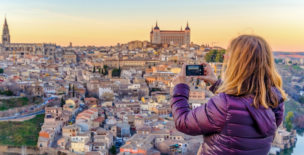 Woman at the Mirador del Valle viewpoint on a half day tour of Toledo