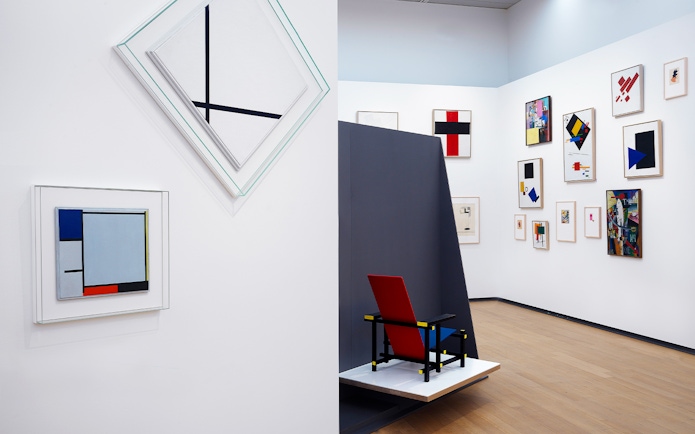 Abstract art and De Stijl chair inside Stedelijk Museum, Amsterdam.