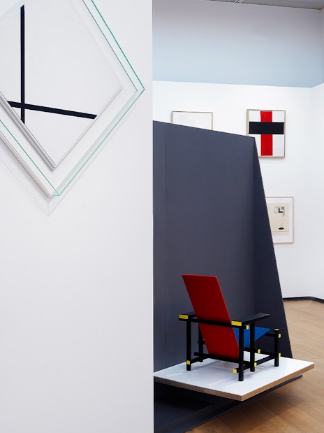 Abstract art and De Stijl chair inside Stedelijk Museum, Amsterdam.