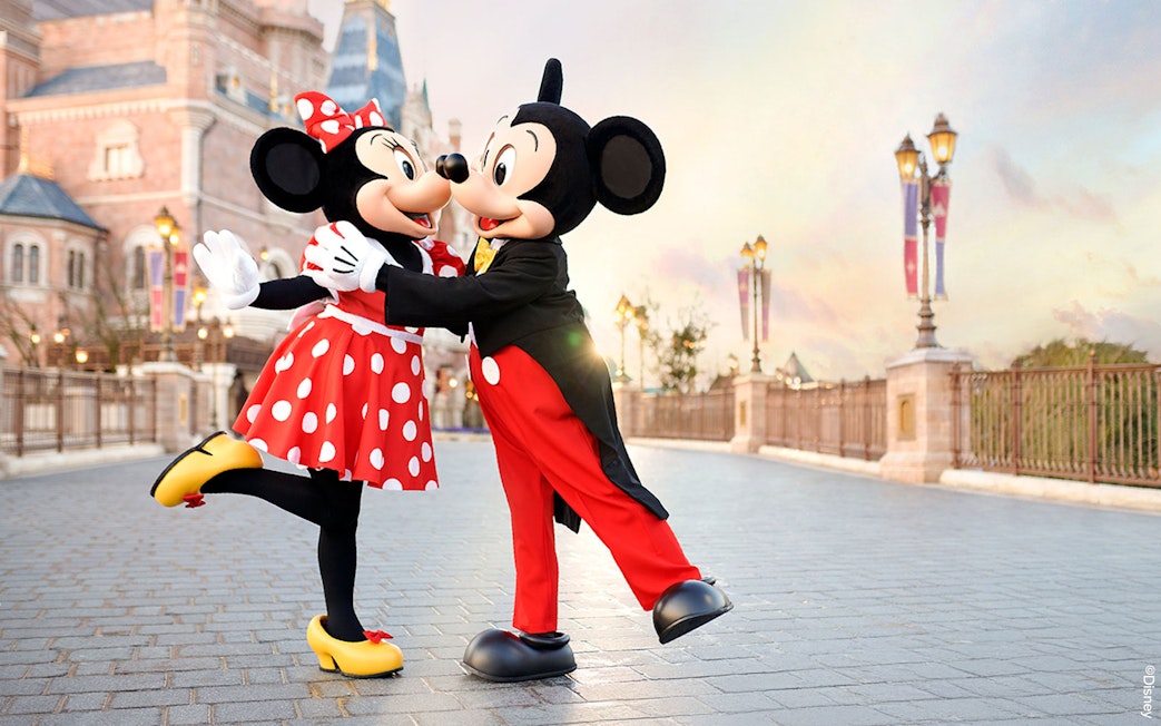 Mickey and Minnie Mouse dancing at Shanghai Disney Resort.