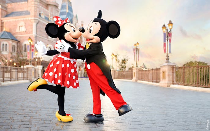 Mickey and Minnie Mouse dancing at Shanghai Disney Resort.