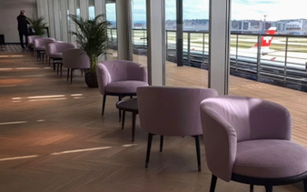 Aspire SKY Lounge seating area with airport view at Zurich Airport Terminal E.