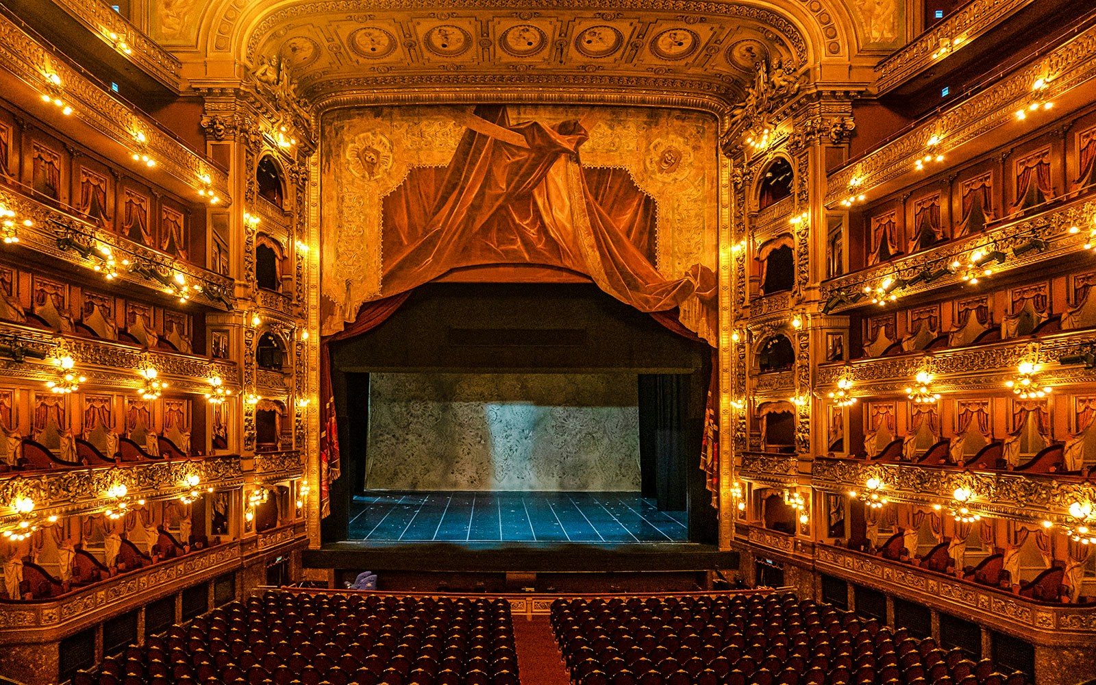 Teatro Colon interior with ornate balconies and stage in Buenos Aires.